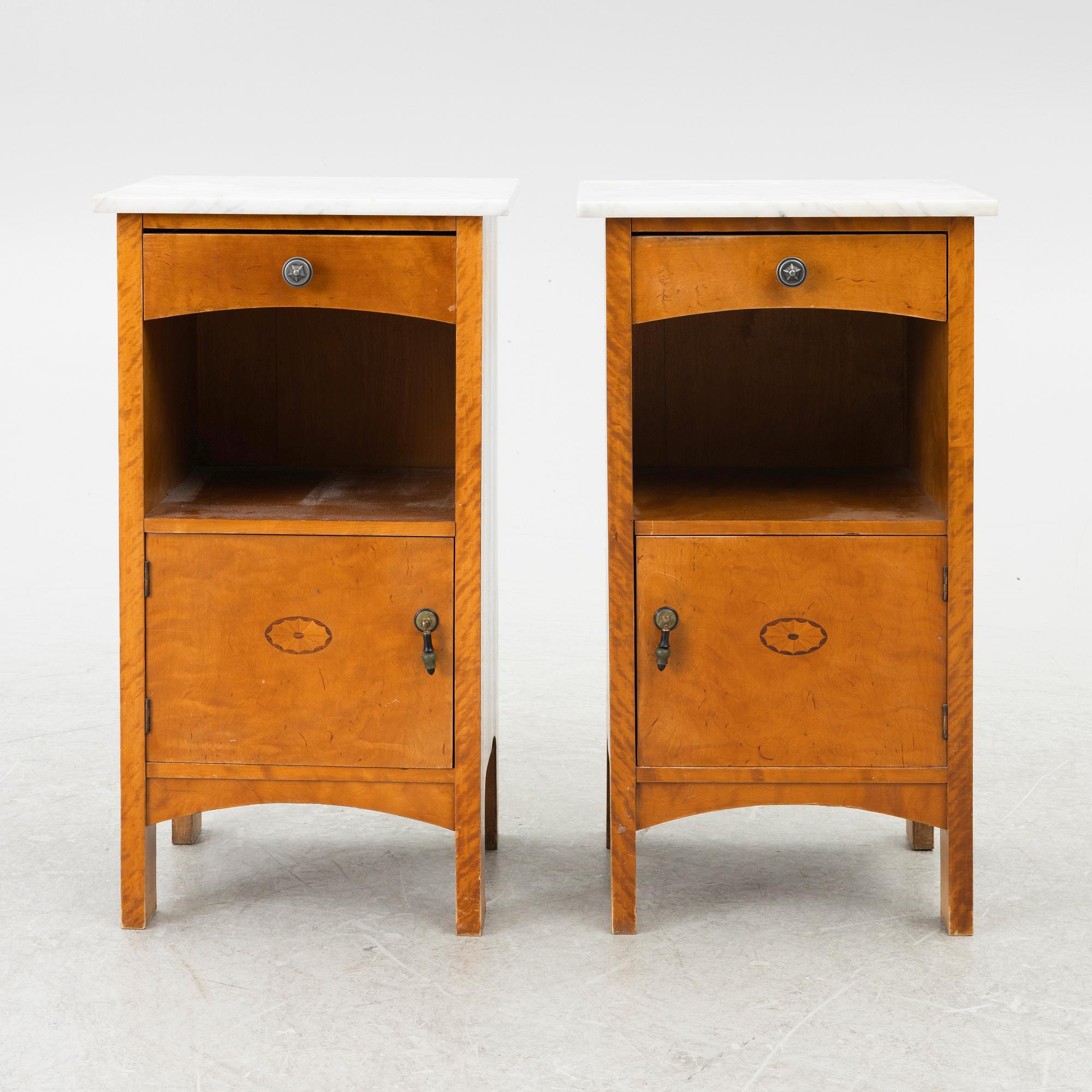 A pair of early 20th century bedside tables.