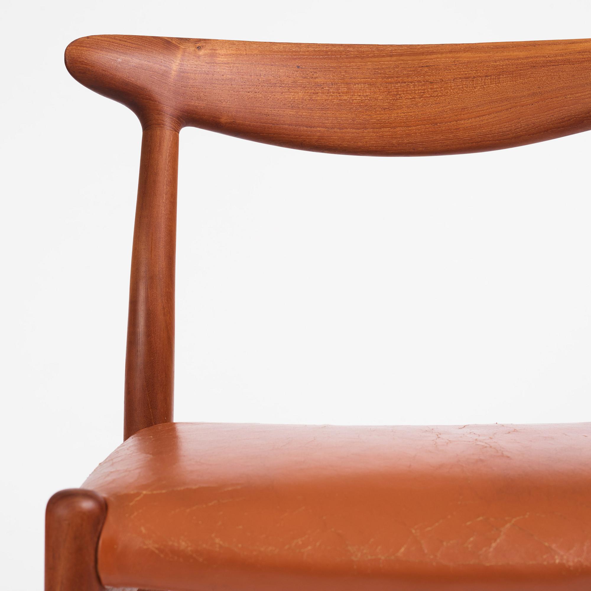 Hans J. Wegner, a set of eight teak chairs model "W2", C.M. Madsens Fabriker, Denmark 1950s.