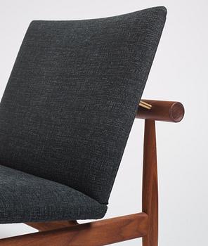 Finn Juhl, a pair of armchairs, "Japan", House of Finn Juhl, Denmark, 21st century.