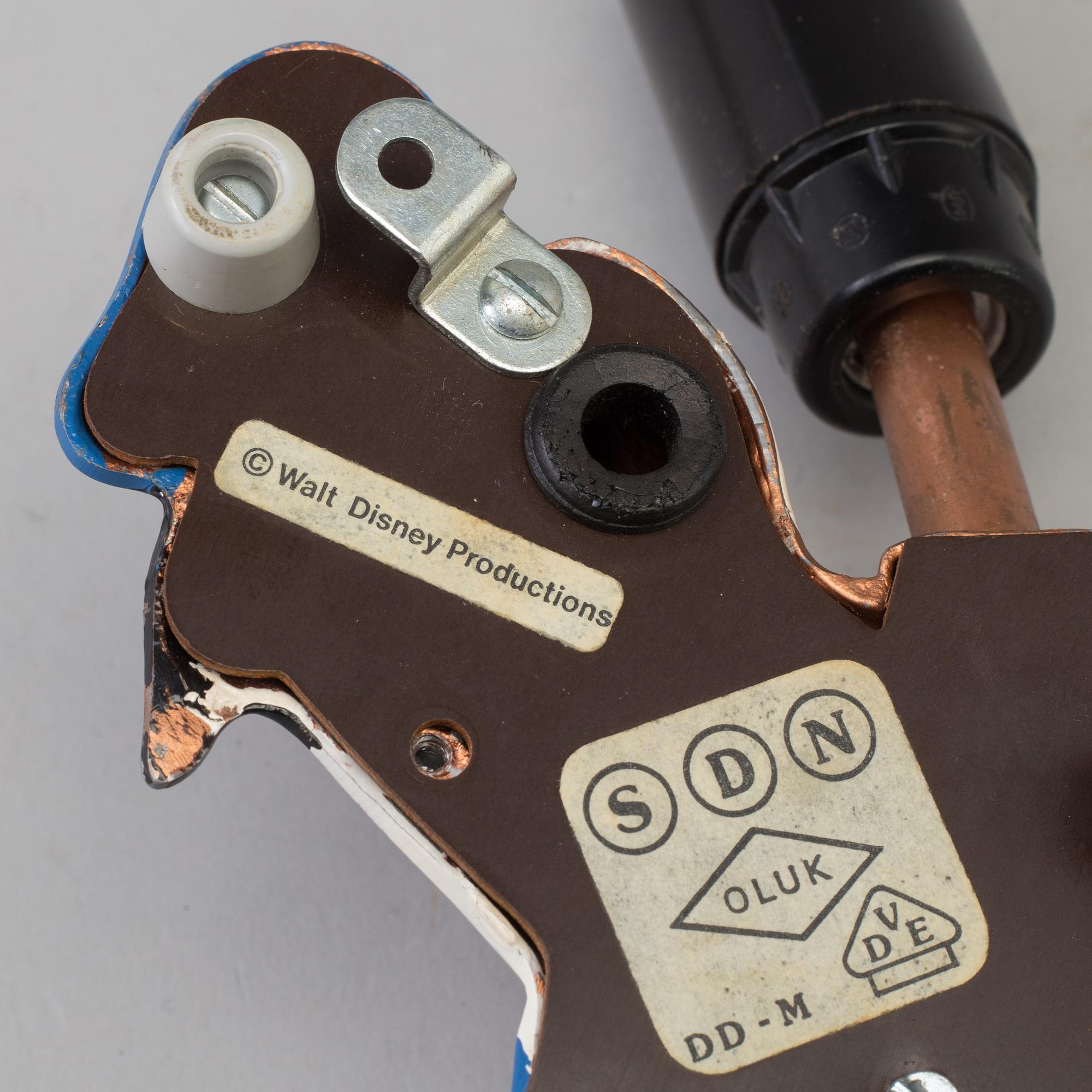 A mid 20th century metal Donald Duck Walt Disney Productions wall light.