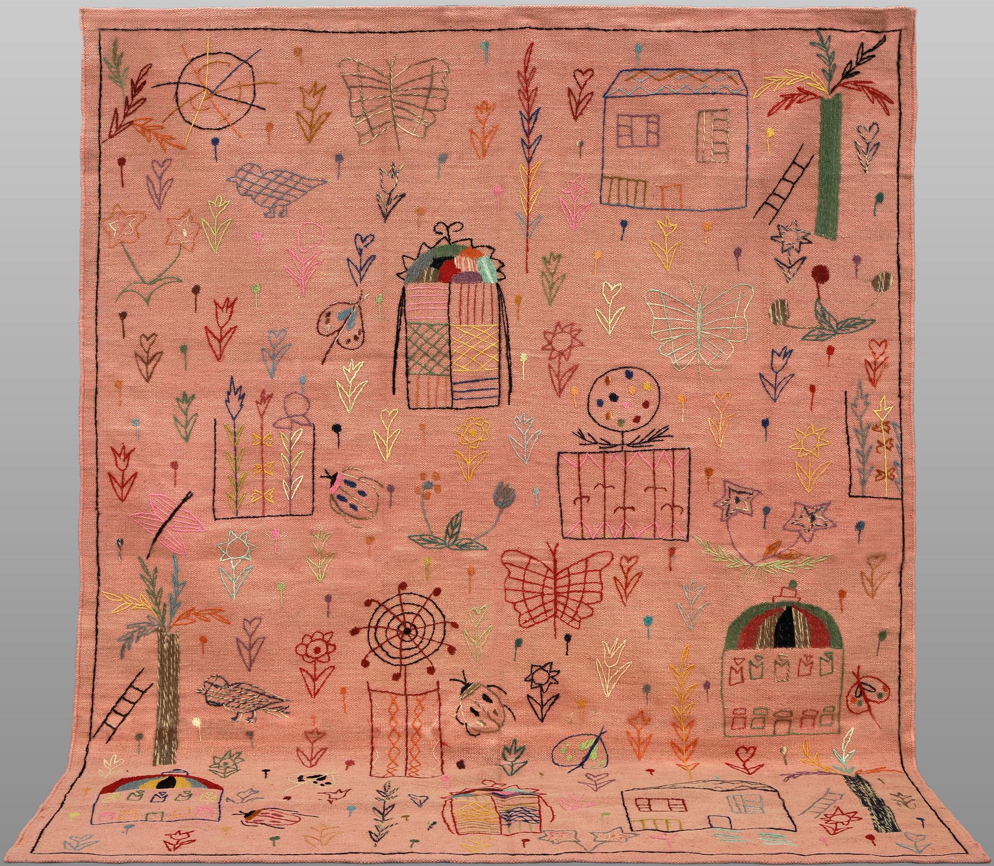 A hand-embroidered Kilim rug, approx. 241 x 180 cm.
