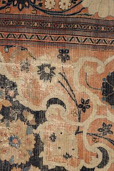 An antique Persian Doroshk carpet, signed, ca 475 x 397 cm.