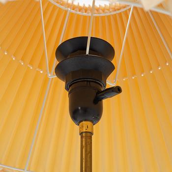 A brass floor light, seond part of the 20th Century.