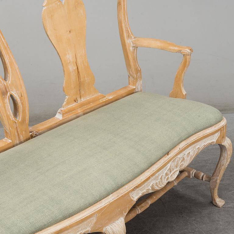 A mid 20th century Rococo style sofa.