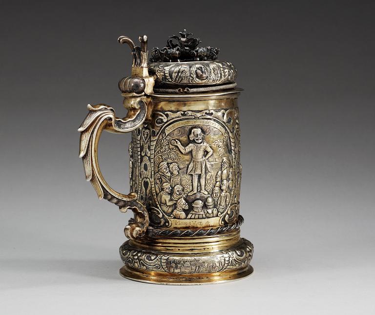 A 17TH CENTURY SILVER-GILT TANKARD, Makers mark of Erhardus Würstemann (1612-1677), Löcse. Depicting the story of Judith and Holofernes.