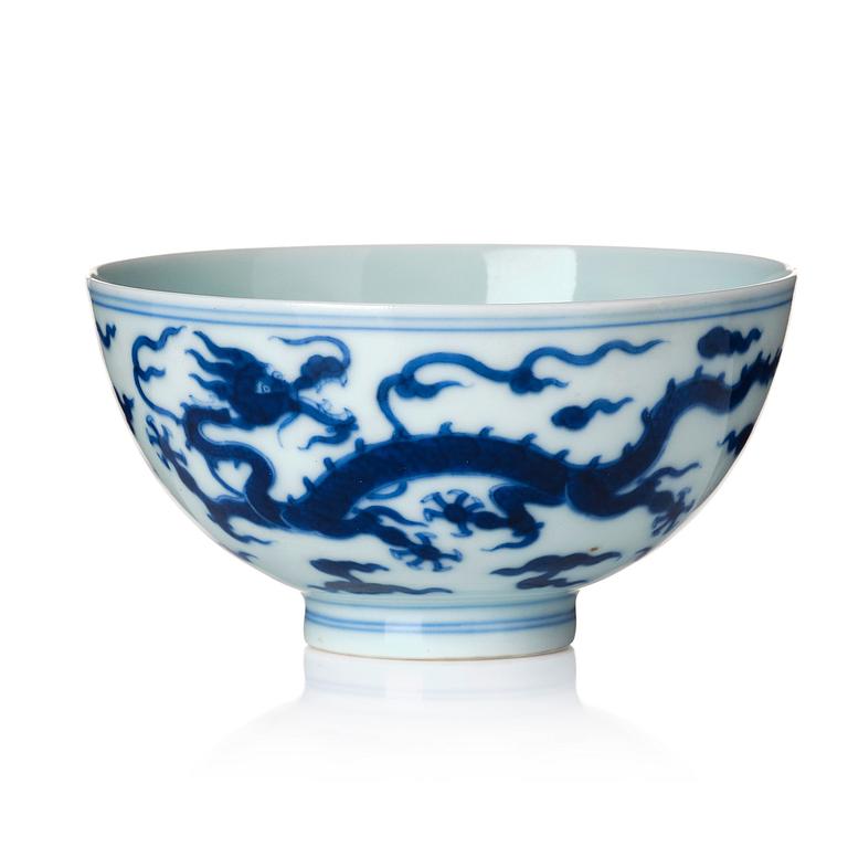 A blue and white 'five clawed dragon' cup, Qing dynasty, with Yongzheng mark and of the period (1723-35).