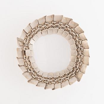 Silver bracelet.