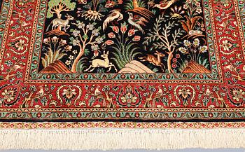 A Tabriz silk rug, approx. 155 x 100 cm.