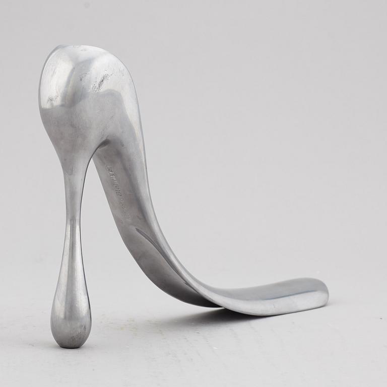 A Manolo Blahnik shoe horn, modern.