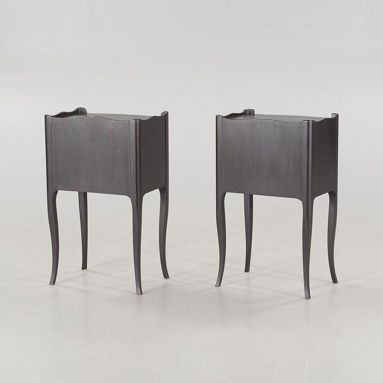 A pair of rococo style bedside tables from the second half of the 20th century.