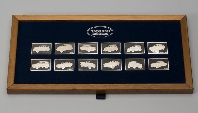PLAKETTER, 12 st, "Volvo 1927-1977", sterlingsilver, vikt 226 g.
