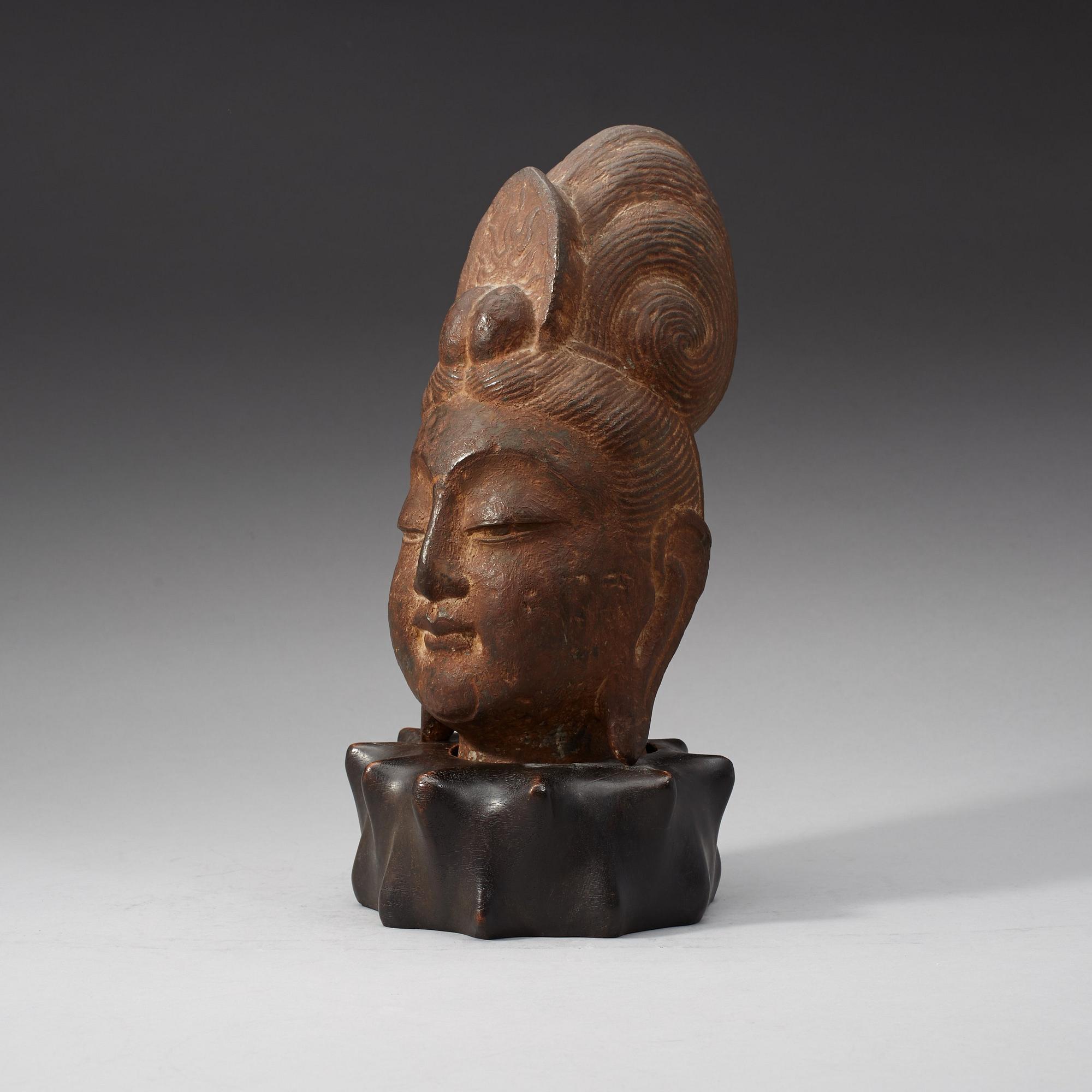 A Chinese stone head of Guanyin, possibly Tangdynasty.