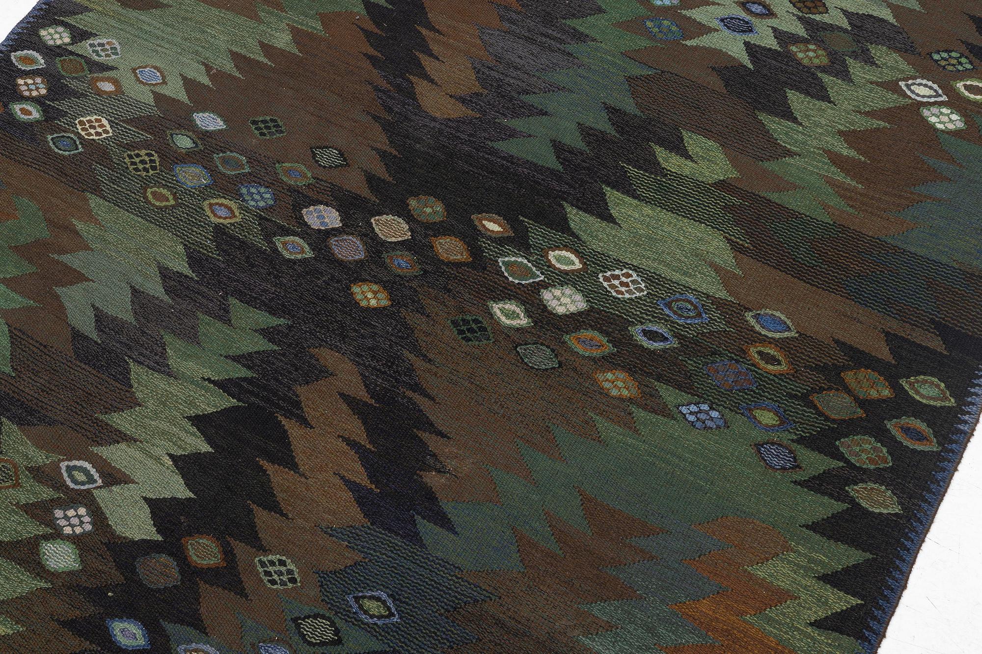 Barbro Nilsson, a carpet, 'Tånga brun och grön', tapestry weave, c. 286 x 186 cm, signed AB MMF BN.