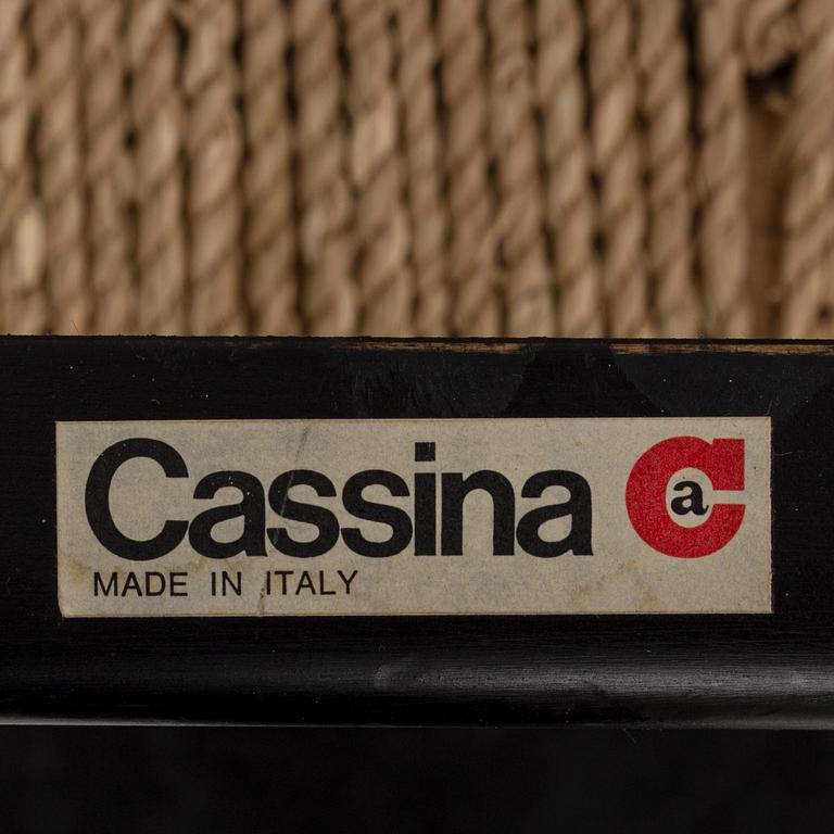 Vico Magestretti. Four black lacquered chairs with rope seats, "Carimate". Cassina, Italy.