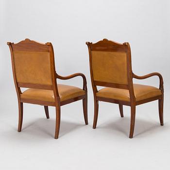 A pair of armchairs, possibly Boman, around 1900.