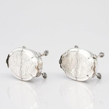 A pair of Latvian Rococo silver salt and pepper stands, marks of Johan Christian Henck (Henke), Riga 1768-80.