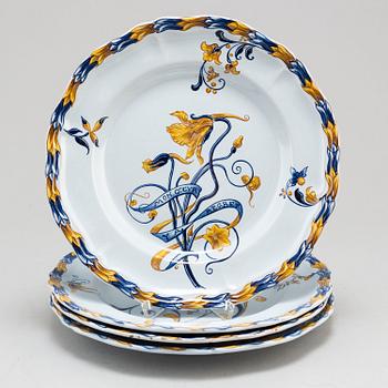 A set of four french faience cabinet plates signed Emile Gallé, Nancy. C. 1900.