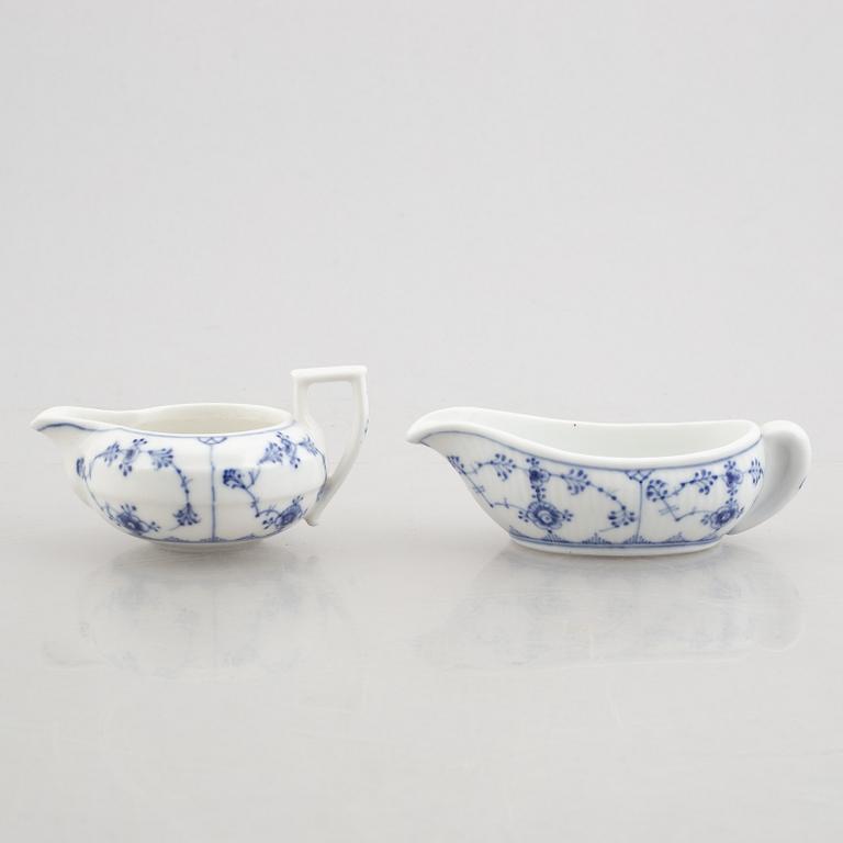 A group of three egg cups, a pair of salt/pepper shakers and two sauce boats, "Blue Fluted"/"Musselmalet", Royal Copenha.