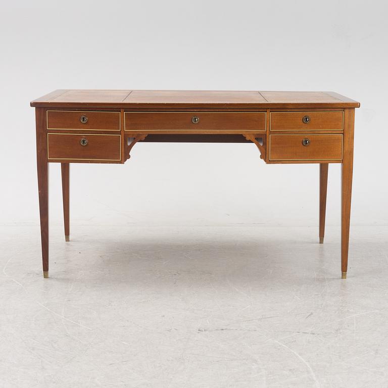 A Gustavian style writing desk and chair, 20th century.