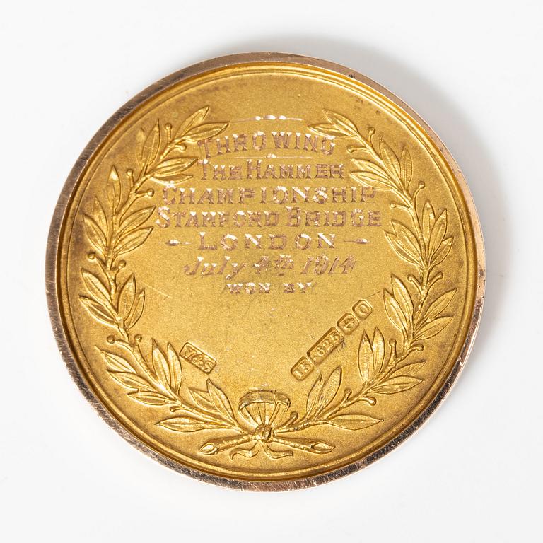 A medal, 15K gold, England, 1914.