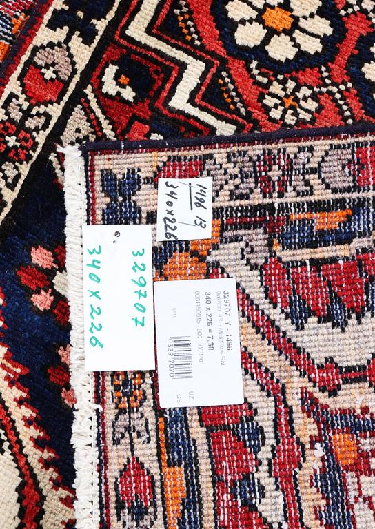 A Bakhtiari carpet, c. 340 x 226 cm.