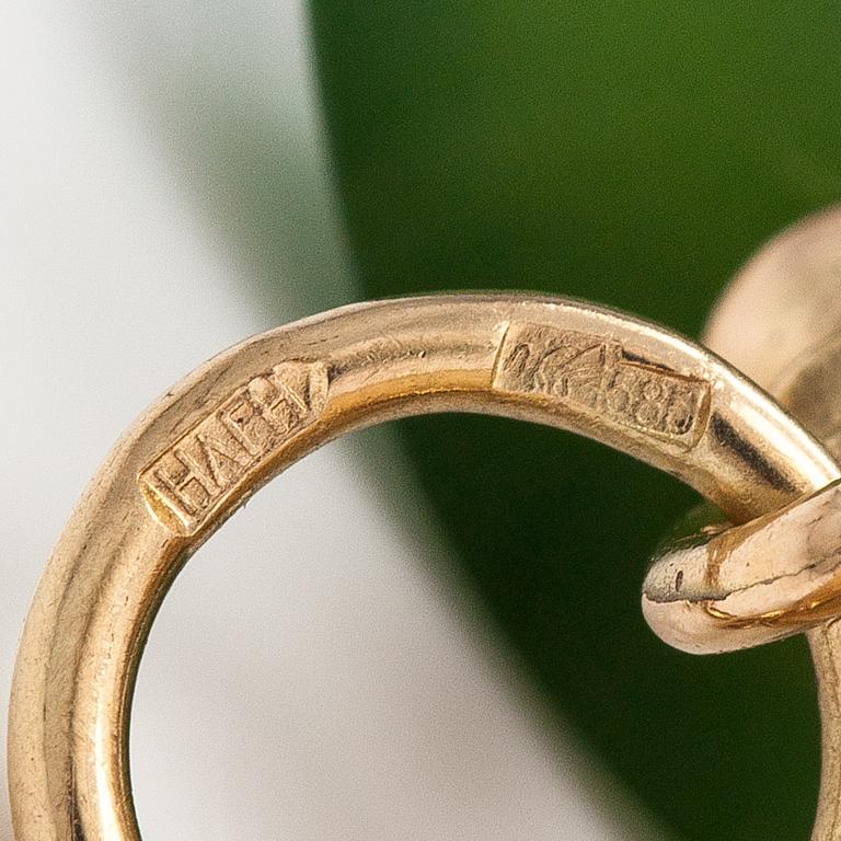 A pair of 14K gold cufflinks with enamel, jade and diamonds ca. 0.018 ct in total. St-Petersburg, Soviet union.