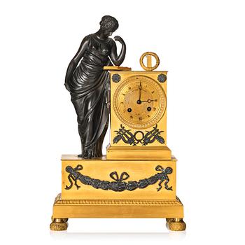 A French Empire early 19th century mantel clock, by Antoine André Ravrio.