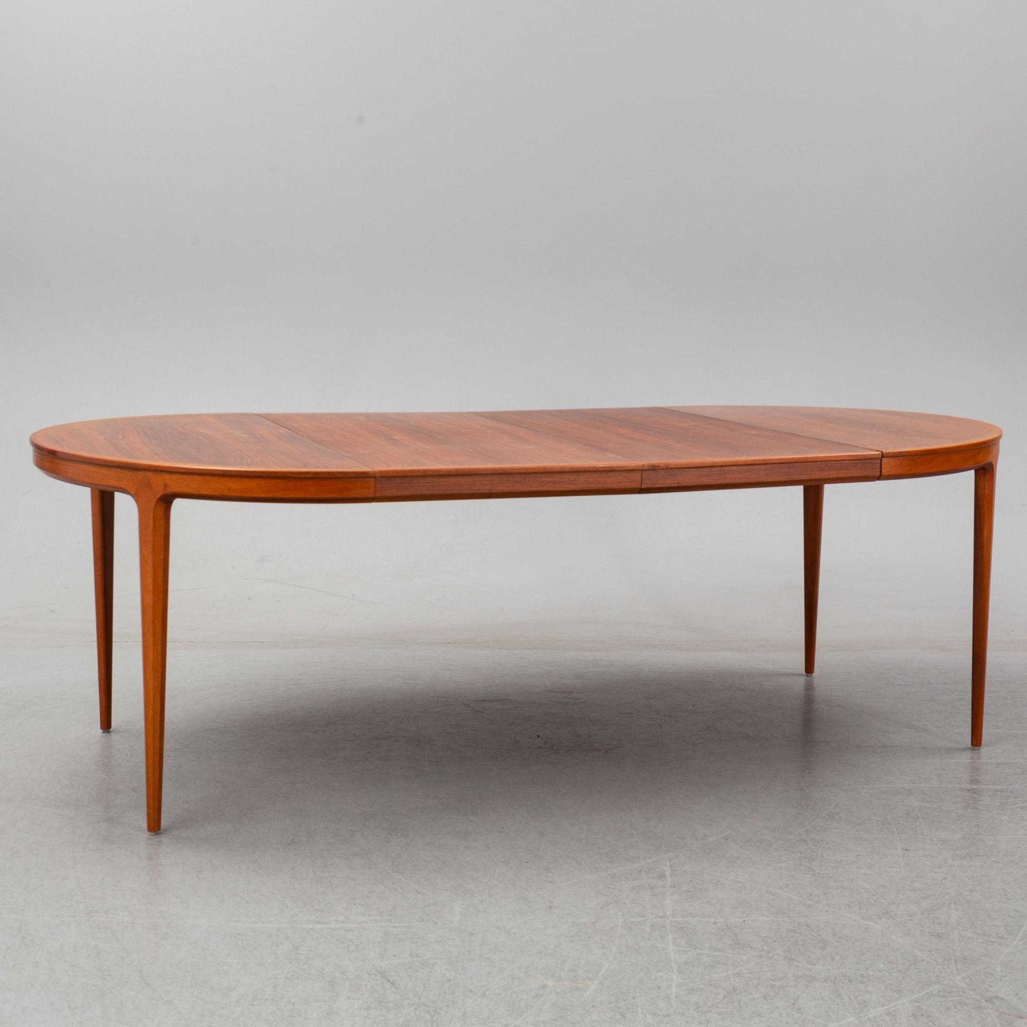 A 1960's 'Diamant' teak dining table by Bertil Fridhagen with two additional leaves.