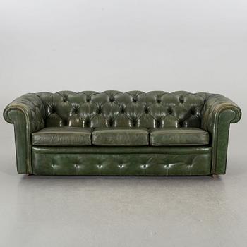 A Pegasus Chesterfield-model sofa and armchair.