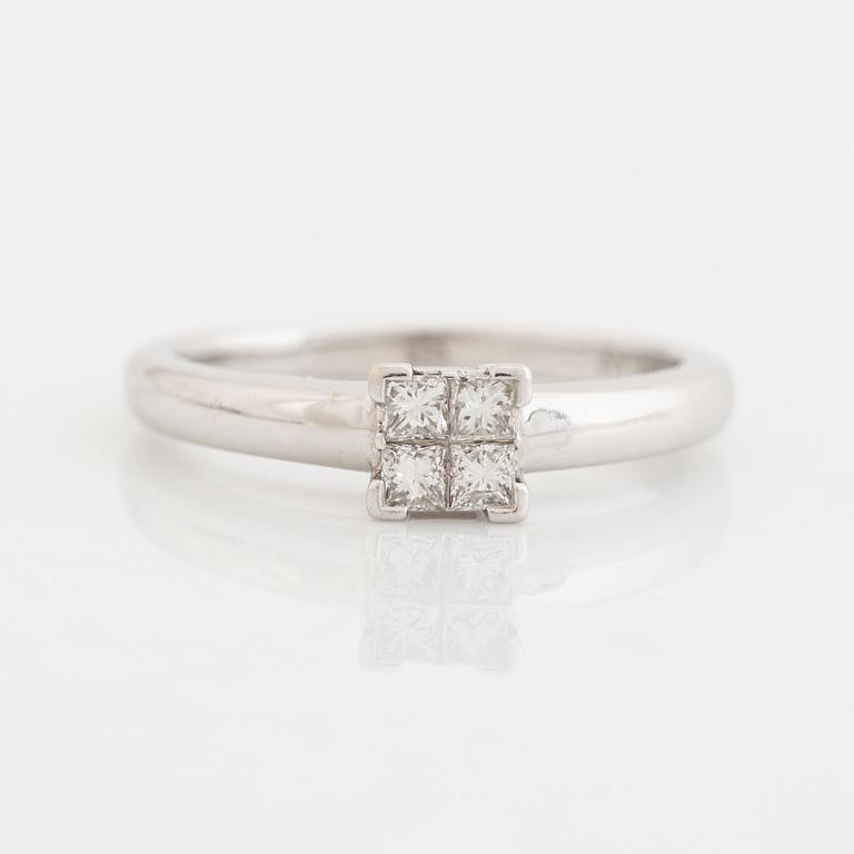 Four princess cut diamond ring.