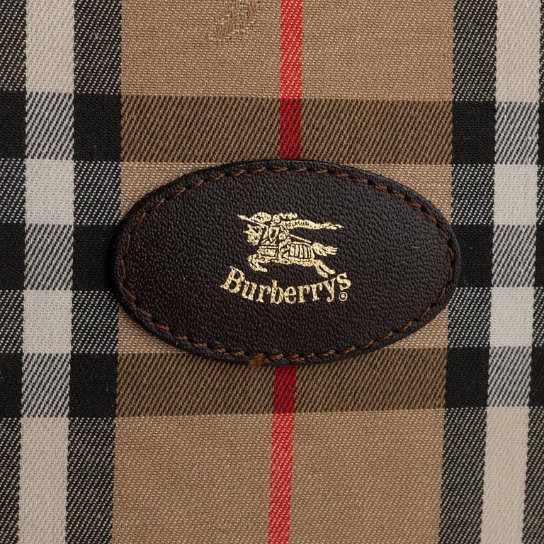 Burberry, a Nova Check tote bag and umbrella.