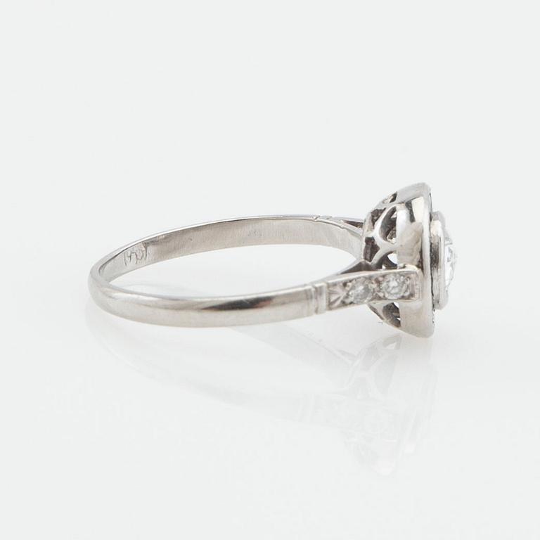 Halo ring, platinum with rose-cut diamond and sapphires.