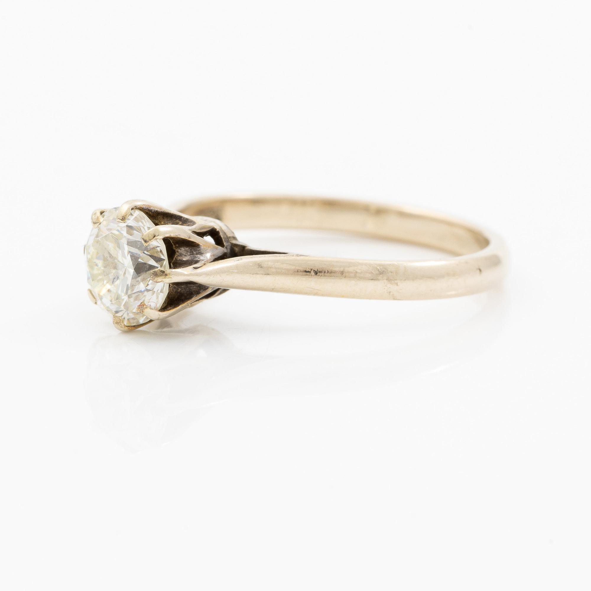 Ring, 18K white gold with brilliant-cut diamond.