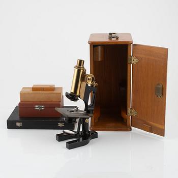 A microscope with accessories, Bausch & Lomb Optical Co. Rochester N.Y, early 20th Century.