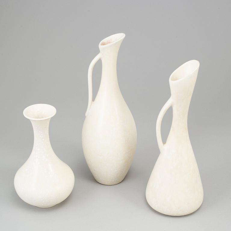 GUNNAR NYLUND, three stoneware vases and two stoneware bowls, Rörstrand, Sweden.