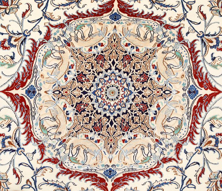 A Nain figural carpet, Part Silk, S.K 6LAA, c. 304 x 205 cm.