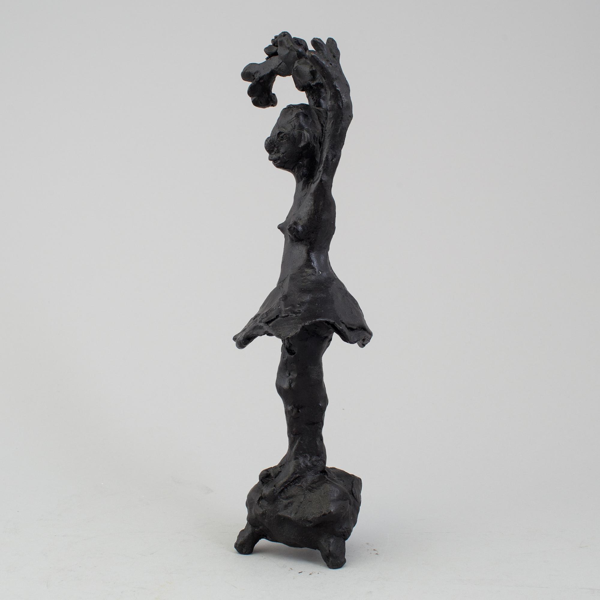 A bronze sculpture by Karin Lind, not signed.