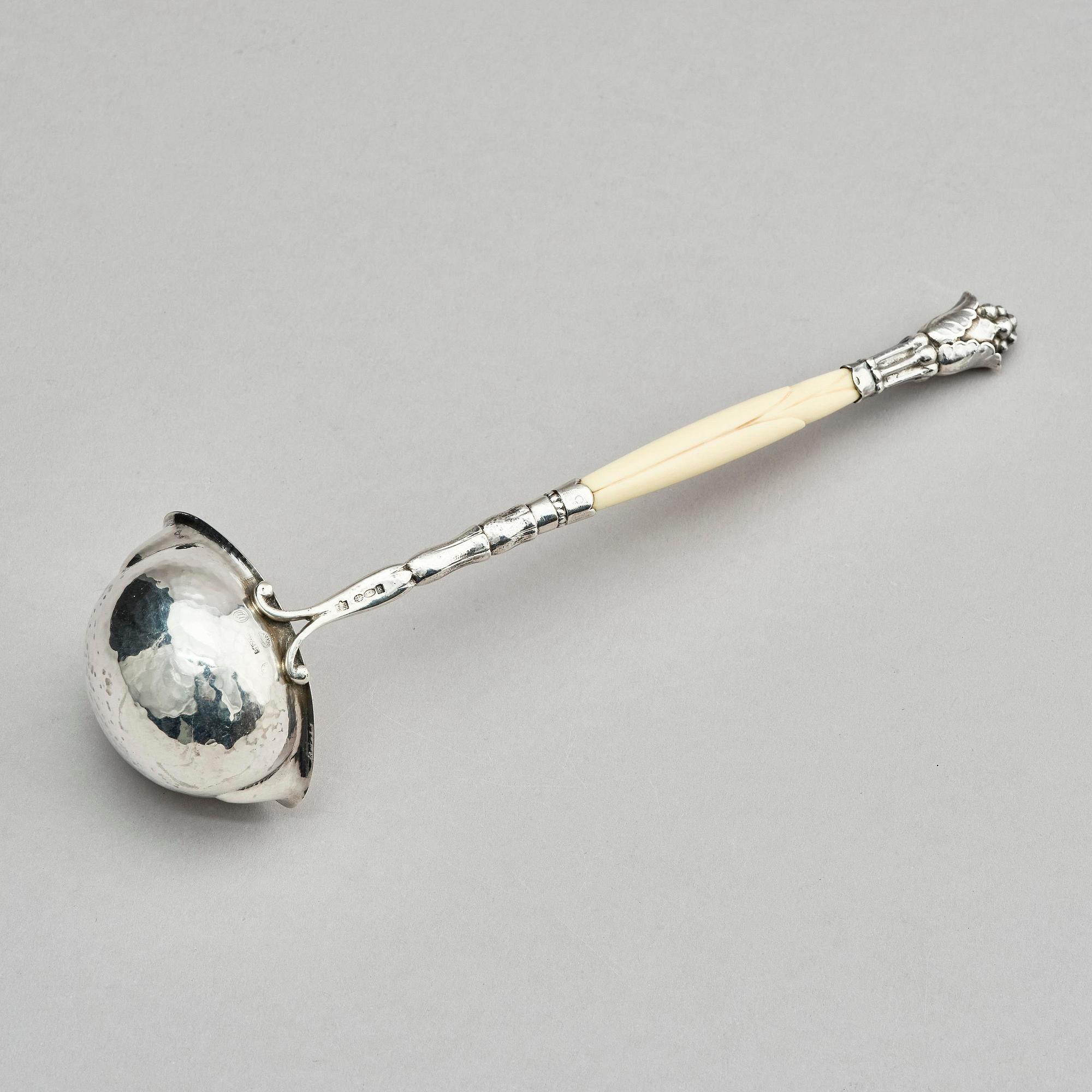 Georg Jensen, a sterling silver and ivory gravy ladle, model no 93, Copenhagen, Denmark 1924.
