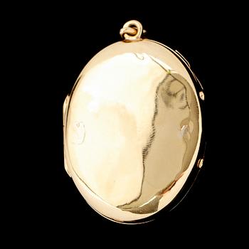 MEDALJONG, 18 k guld, omkring år 1900. Total vikt ca 12 g.