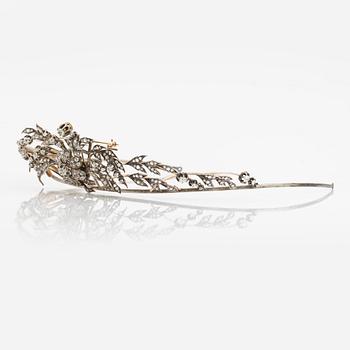 A brooch/tiara combination.