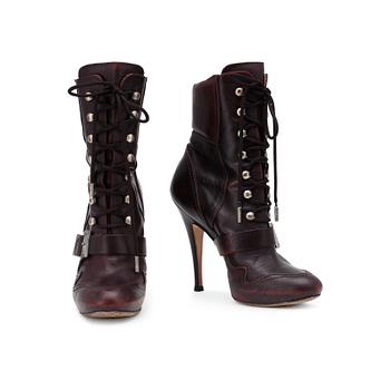 754. JOHN GALLIANO, a pair of brown leather boots.