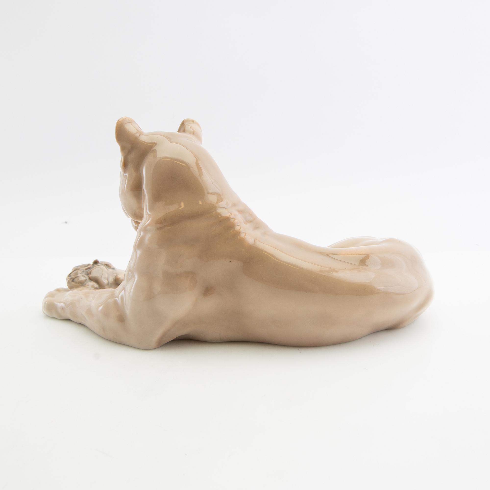 Figurine of a reclining lioness Royal Copenhagen Denmark porcelain.