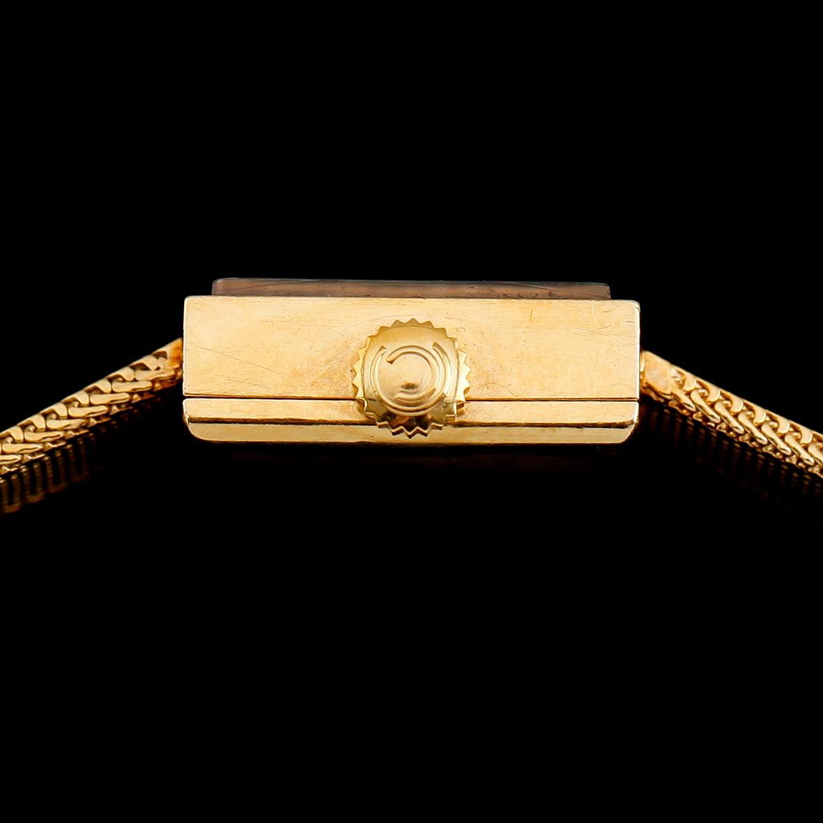 ARMBANDSUR, 18 k guld, Tissot. Total vikt med urverk ca 27 g.