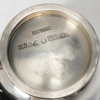 A silver vase and two bowls, Jacob Ängman, Eric Löfman, and Borgila respectively.