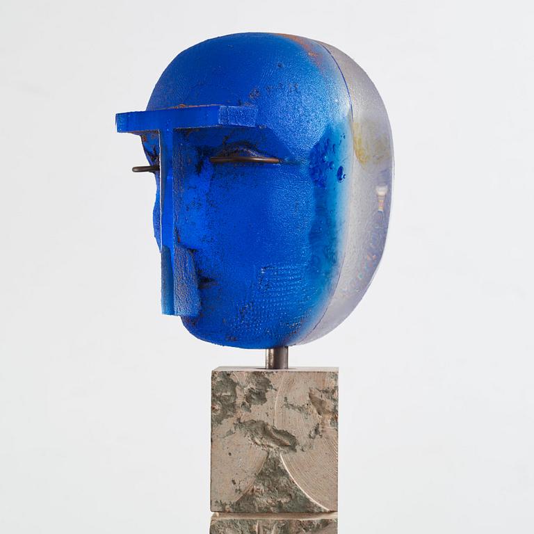 Bertil Vallien, a unique sand casted blue glass 'Head' sculpture on a hewn and polished limestone plinth, Kosta Boda, Sweden.