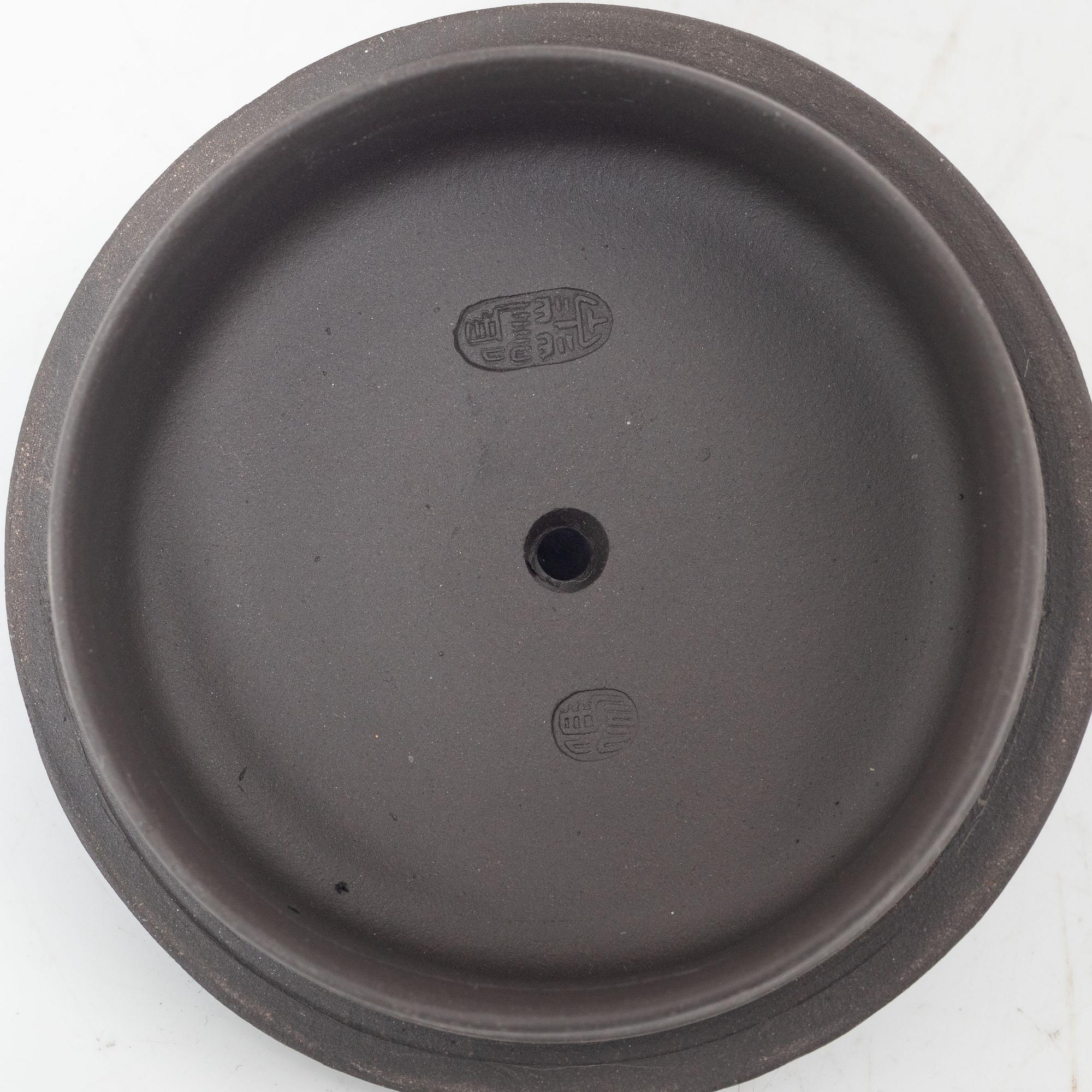 Two Chinese yixing ware teapots, 20th century.