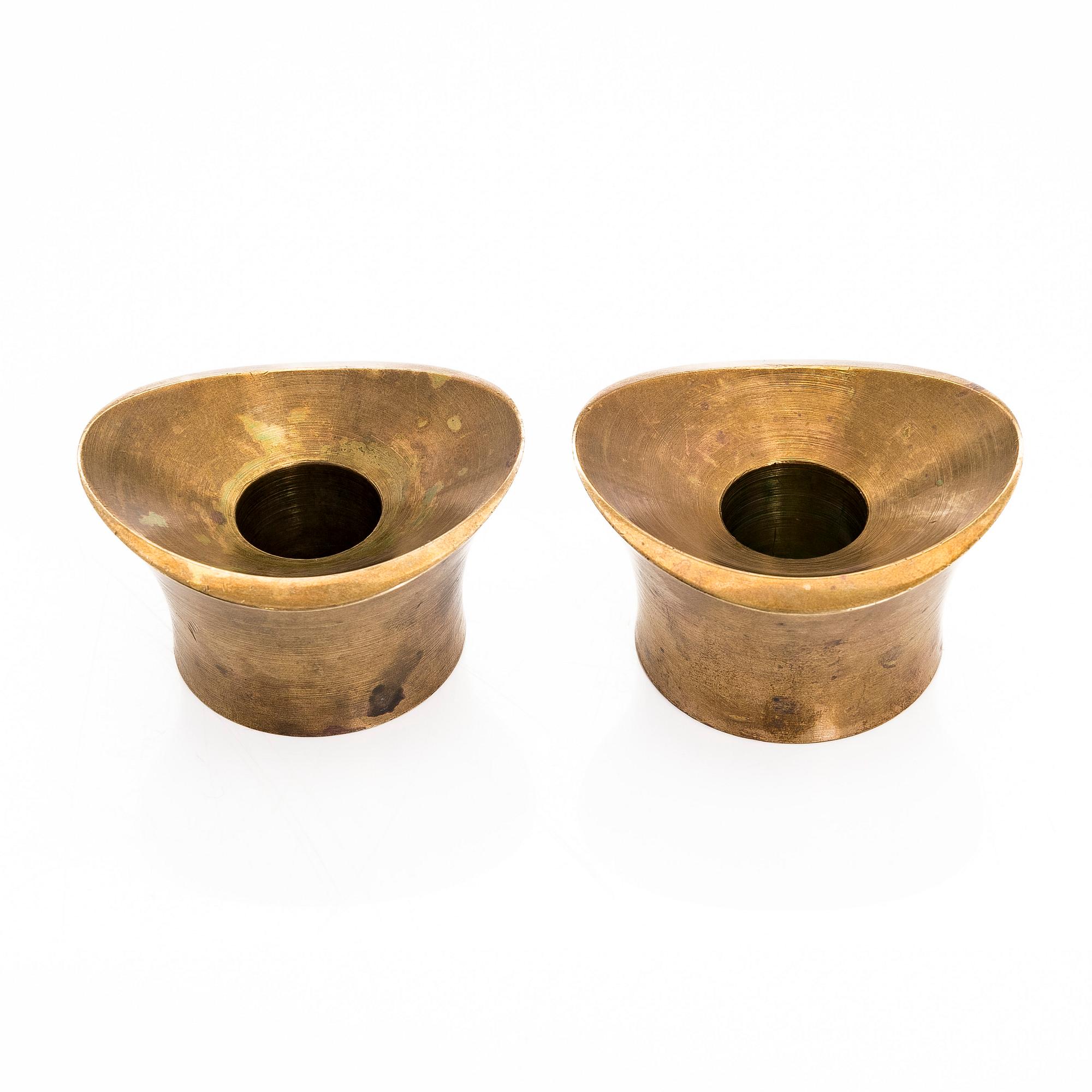 Tapio Wirkkala,  a pair of bronze candle holders for Kultakeskus Oy.
