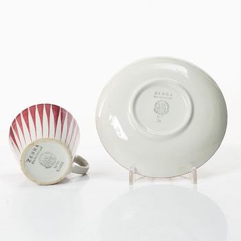 Eugen Trost, Three 'Red Zebra' cream-ware coffee cups on saucers, Uppsala-Ekeby Gefle.