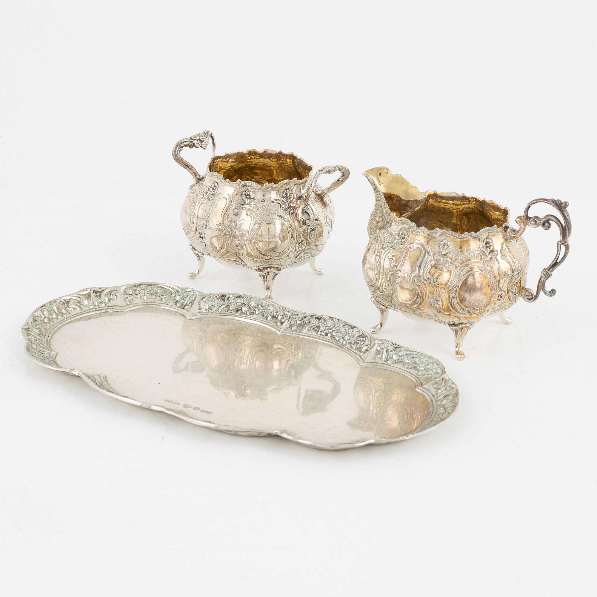 A silver Rococo style creamer, sugar bowl and tray, Gewe Silvervarufabriken Ab, Malmö, Sweden, 1970-71.