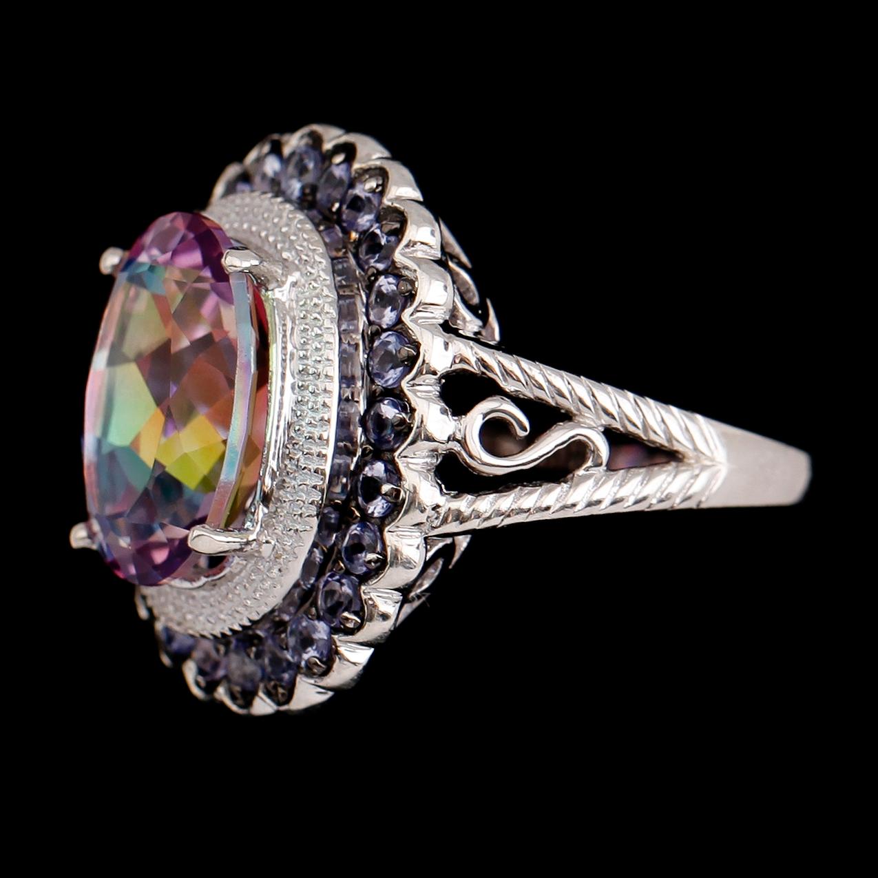 RING, sterlingsilver, blå tanzaniter tot ca 1.50 ct, färgad topas ca 5.00 ct.